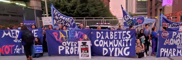 Advocates with signs and banners