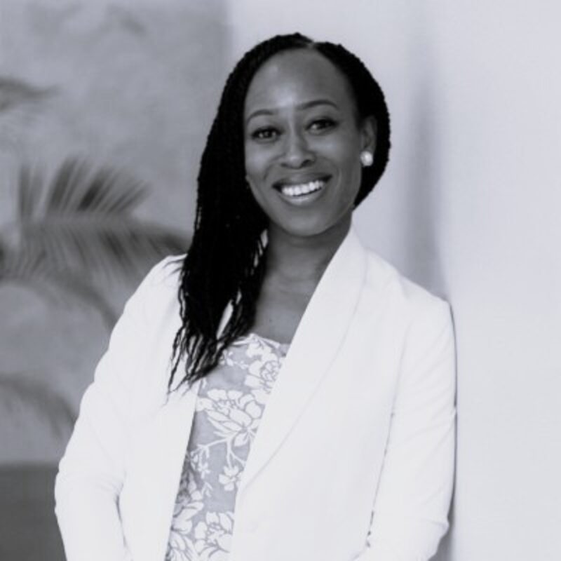 Black and white portrait of Aisha Sykes.