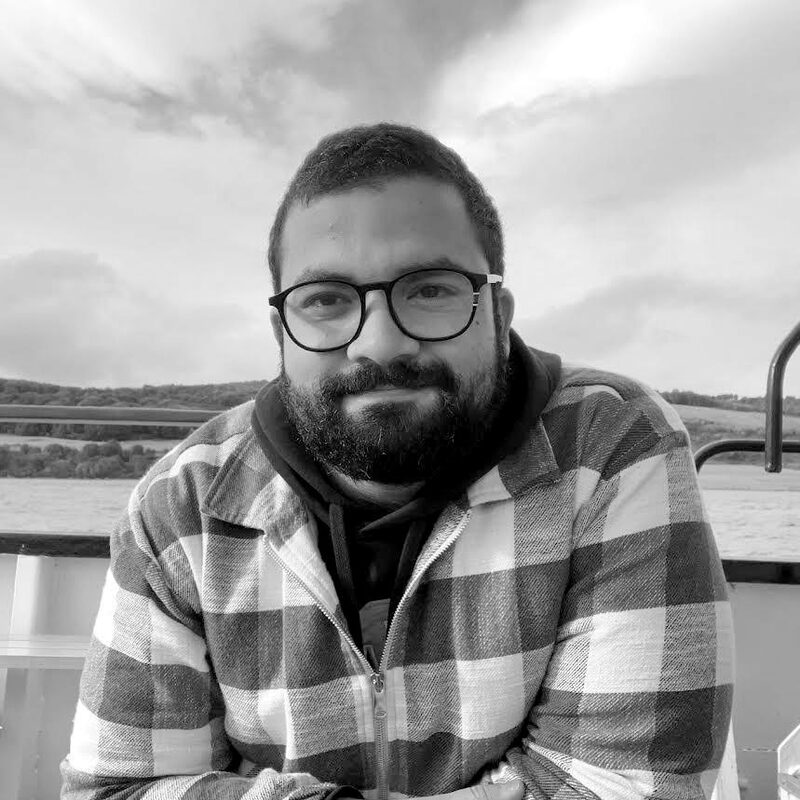 Black and white portrait of Ali Hisham.