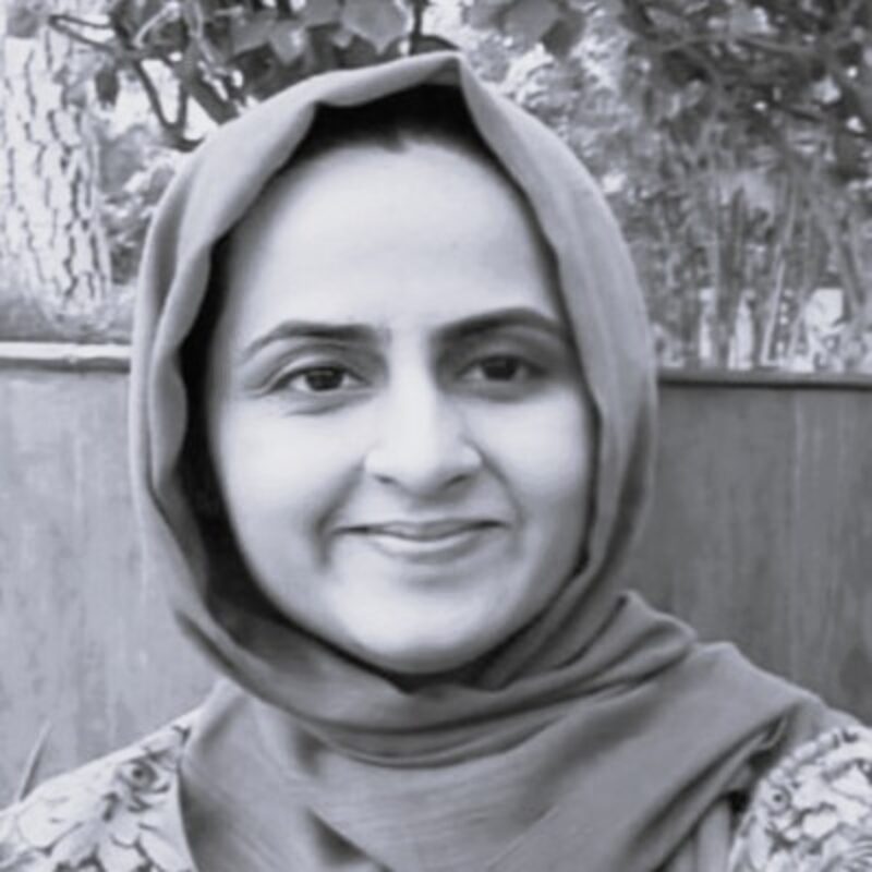 Black and white portrait of Anum Anwar.