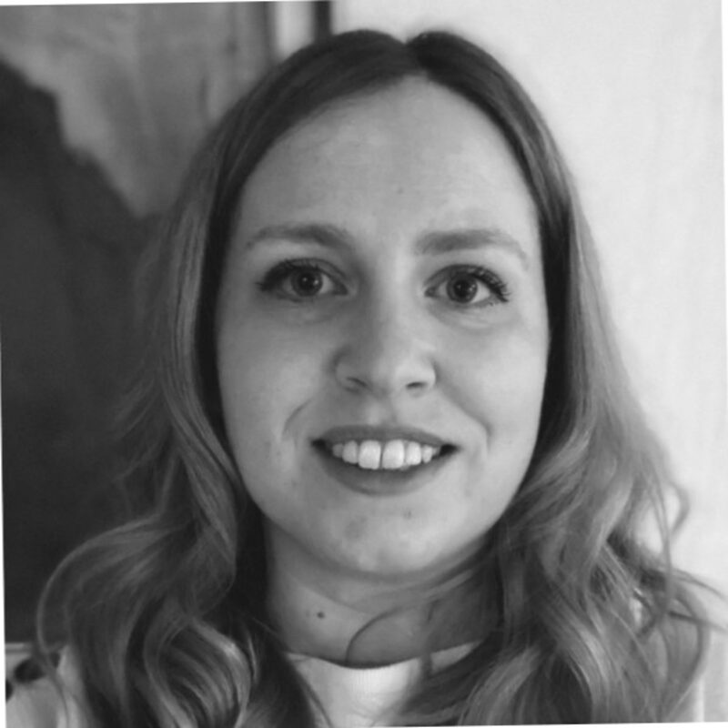 Black and white portrait of Kate Pidwerbecki.