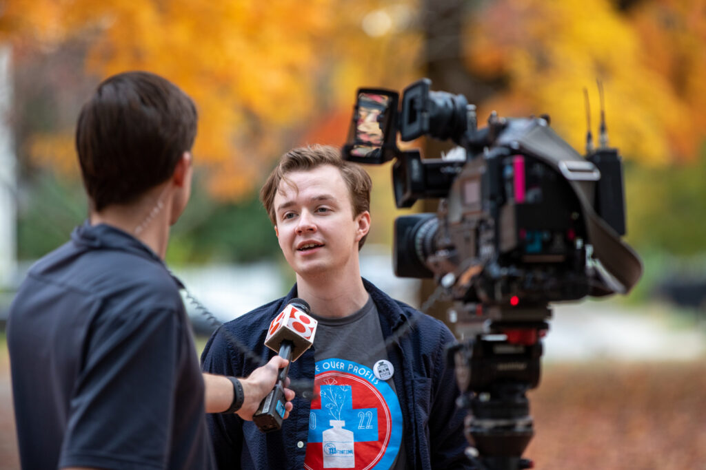 Ian is interviewed by a TV camera