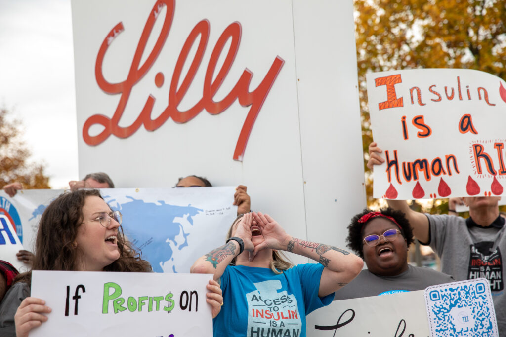 T1International team members and other advocates for affordable insulin participate in a campaign outside the Eli Lilly headquarters, where much of the US insulin supply is made, in Indianapolis, IN on Monday, October 24, 2022. T1I, is a non-profit advocacy organization founded by Elizabeth Pfiester who has had Type 1 diabetes since she was a child. Pfiester and her team, people with and impacted by type 1 diabetes, are working to achieve affordable insulin prices for all, no matter where a patient lives. © Photo by Erin Lubin