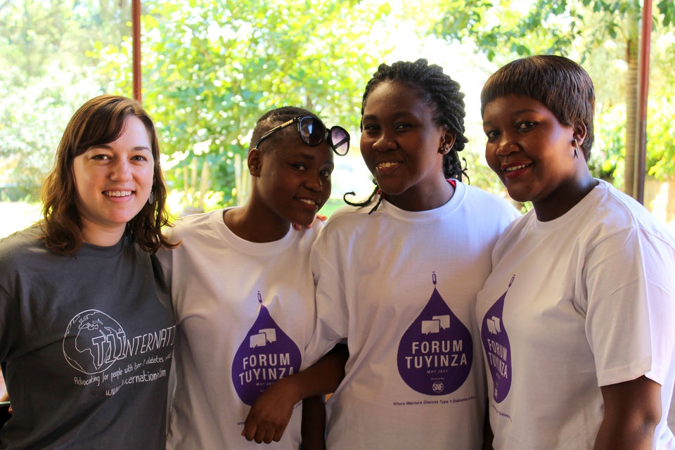 Friends with type 1 diabetes pause for a photo in Kampala, Uganda