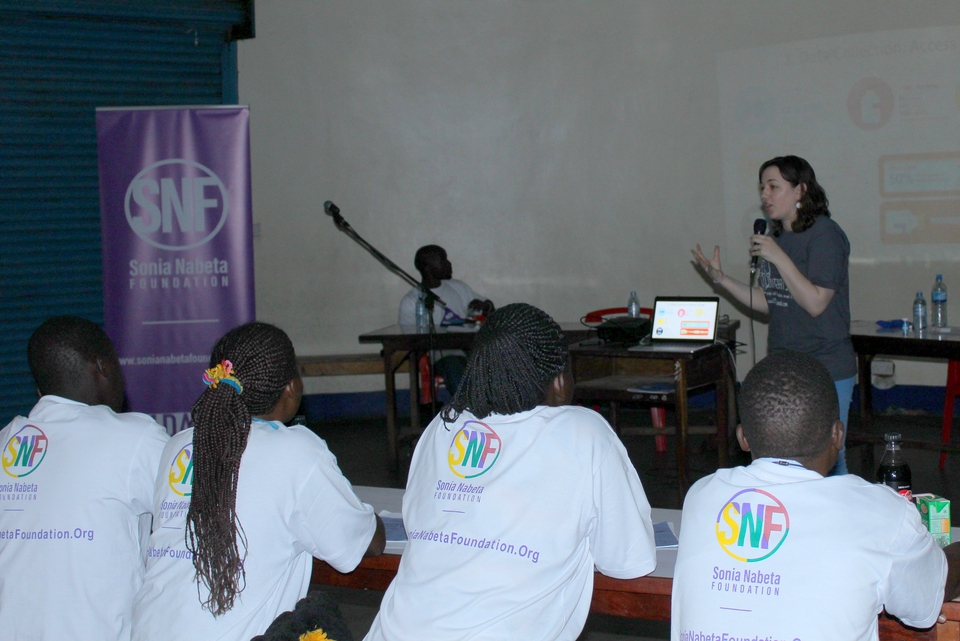 T1International founder gives an intro to advocacy talk in Kampala, Uganda